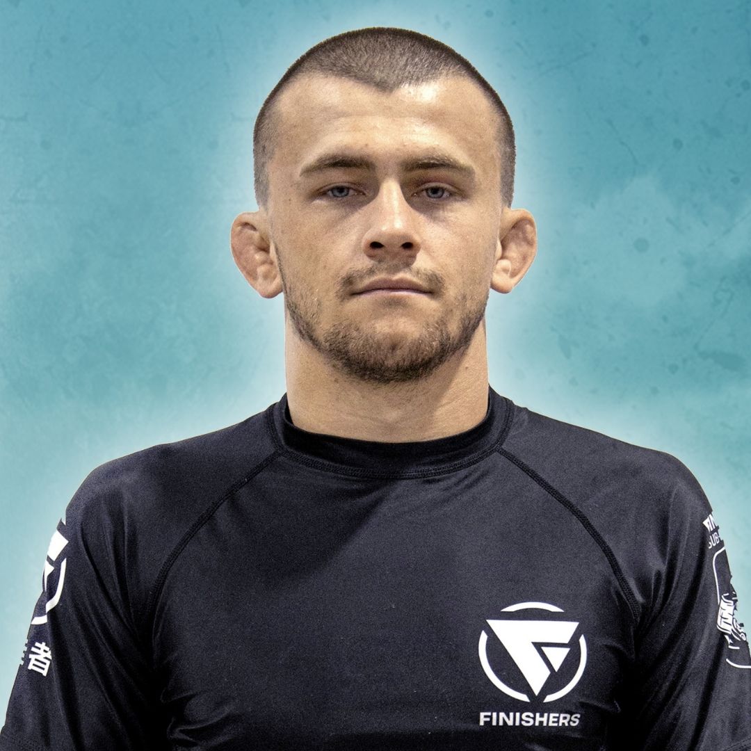 TRAVIS SZALAY